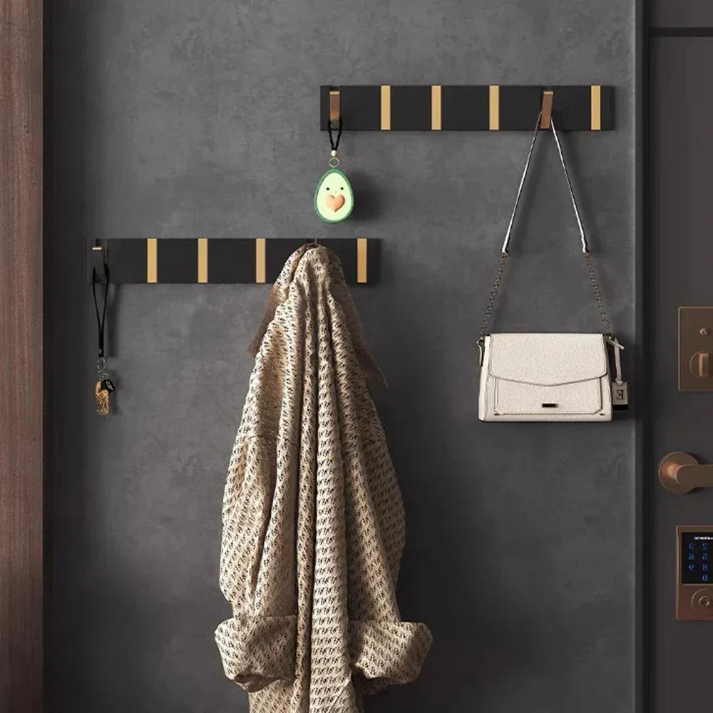 wall-mounted folding hook rail in gold