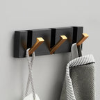 wall-mounted folding hook rail in gold