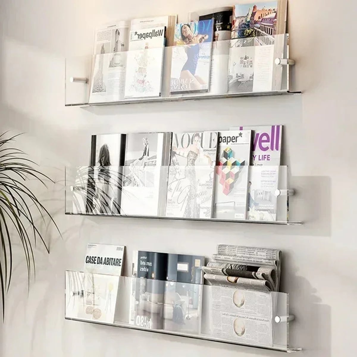 wall-mounted magazine and book display shelf in transparent