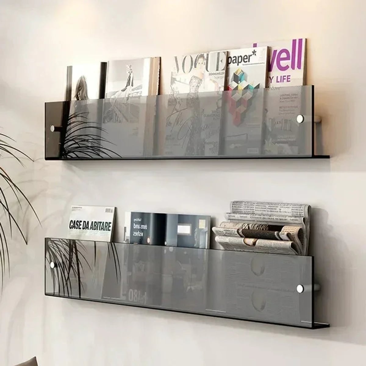 wall-mounted magazine and book display shelf in gray