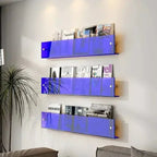 wall-mounted magazine and book display shelf in blue