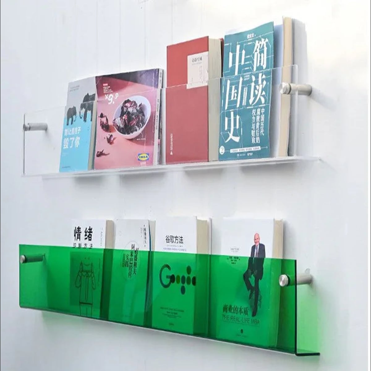 wall-mounted magazine and book display shelf in green