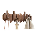 wall-mounted piano key coat hooks in walnut wood