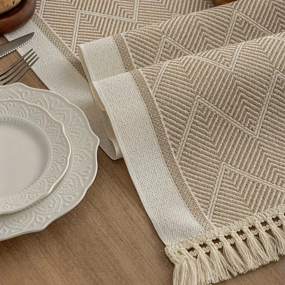 woven tassel table runner in sandstone
