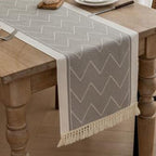 woven tassel table runner in muted grey
