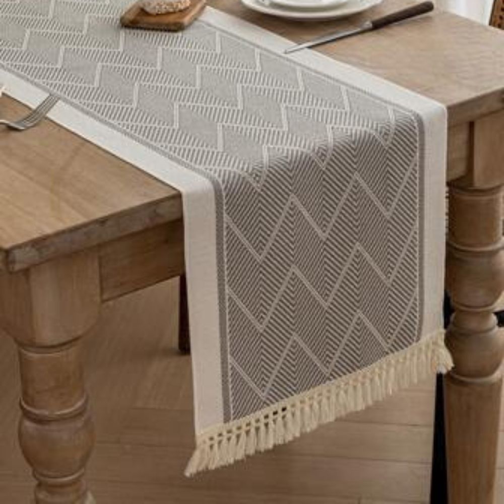 woven tassel table runner in muted grey
